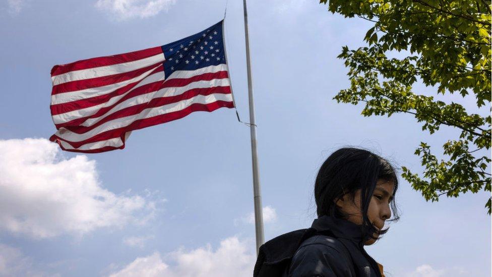 An unaccompanied child migrant at the US border