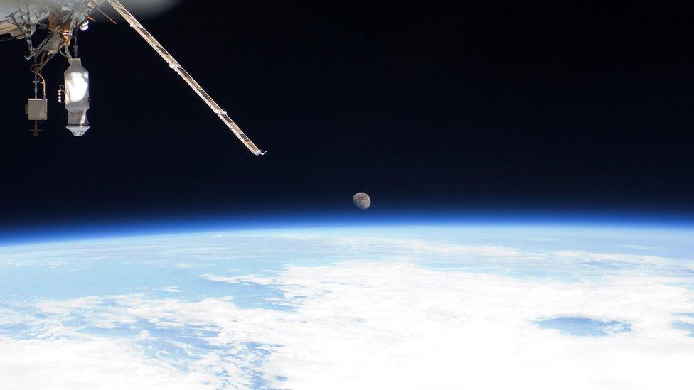 Earth and moon seen from the International Space Station