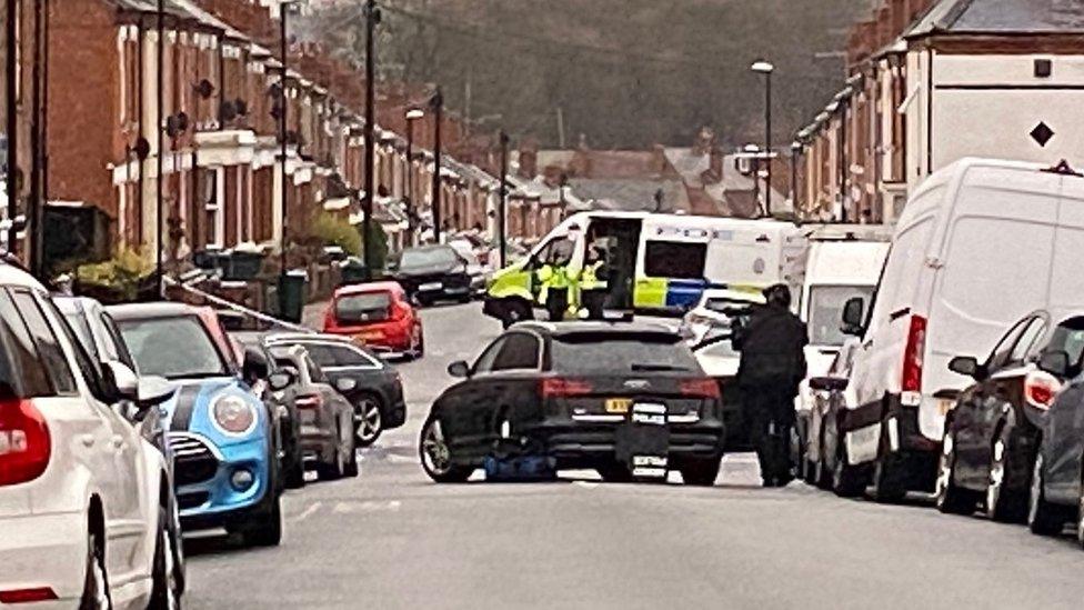 Armed officers on Newcombe Road