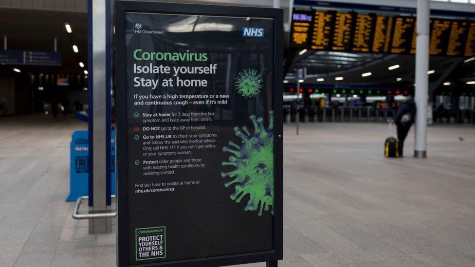 NHS coronavirus advice sign at London Bridge Station