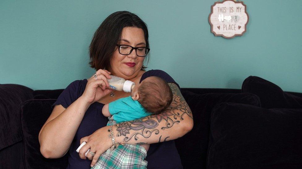 Brandy Sloan feeds her son formula