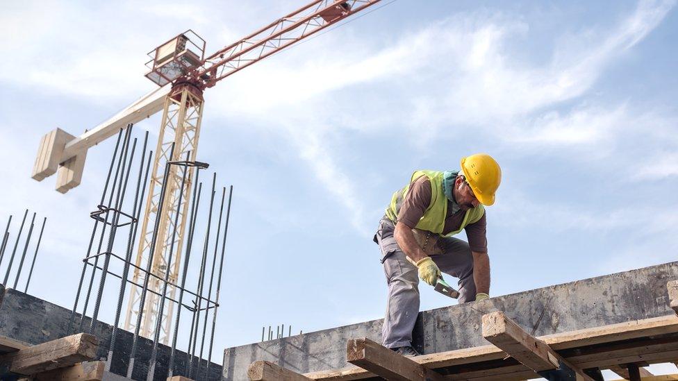 builder on construction site