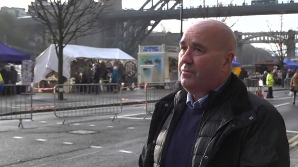 Councillor Ged Bell, with Newcastle's Quayside Market behind