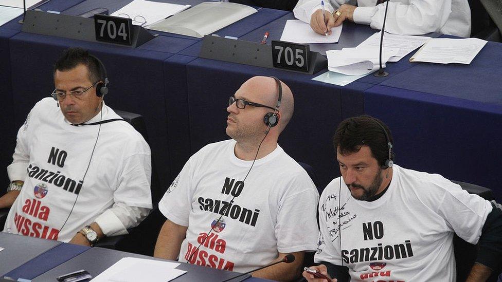 Member of the european parliament and the Italian far right Party Lega Nord, North league, Gianluca Buonanno, L, Lorenzo Fontana , Matteo Salvini wear t-shirts with a slogan reading, no sanzioni alla russia, ( no to Sanctions to Russia) in the plenary room ahead of the vote to the EU-Ukraine association agreement on September 16, 2014 in Strasbourg, France