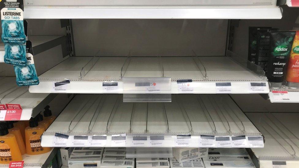 An empty shelf as hand sanitiser is sold out in a Boots store in Clapham, London