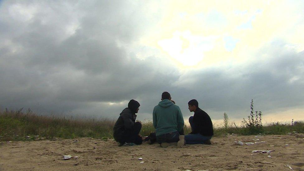 Children talking in the Calais Jungle