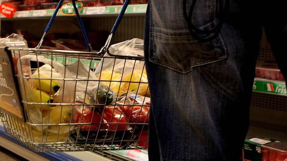 Man shopping in supermarket