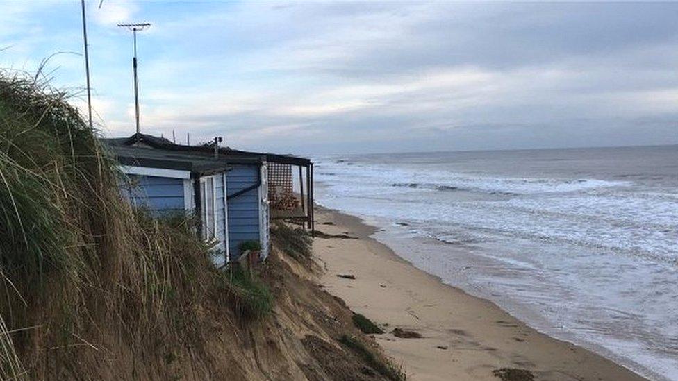 Cliff-top home overhanging Hemsby cliff