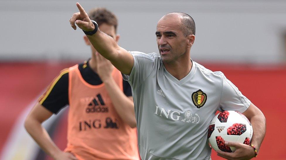 Belgium coach Roberto Martinez speaks to players during a training session at the Guchkovo Stadium in Dedovsk on 30 June 2018