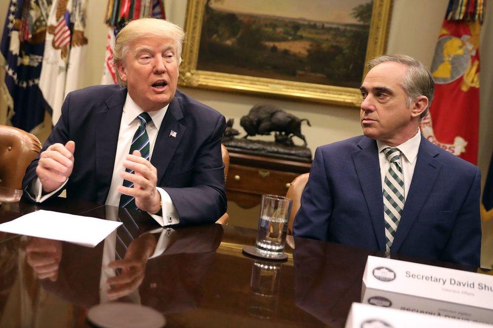 Mr Shulkin sitting next to Trump