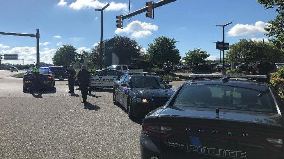 Police with sniffer dogs are searching the evacuated airport