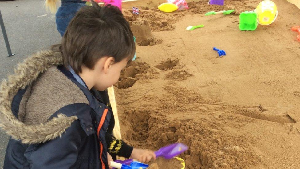 Kids in the sand pit.