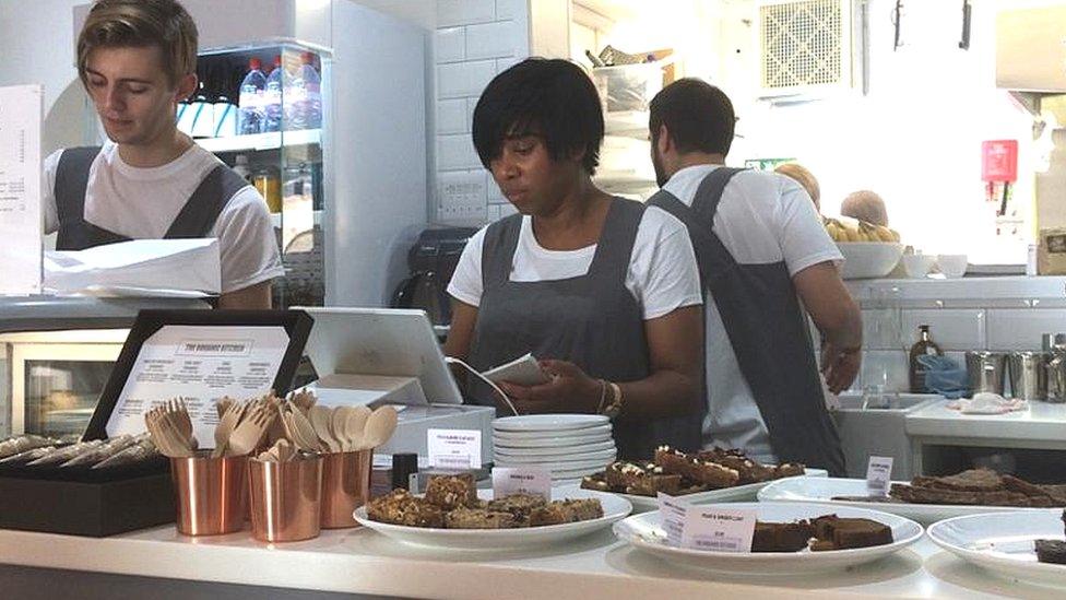 Hilary Penning behind the till