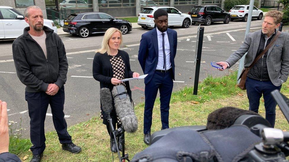 Sandra Larmour reads a statement to media following the conclusion of the inquest