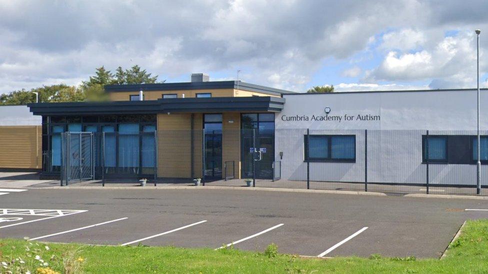 Streetview of school, single storey white building