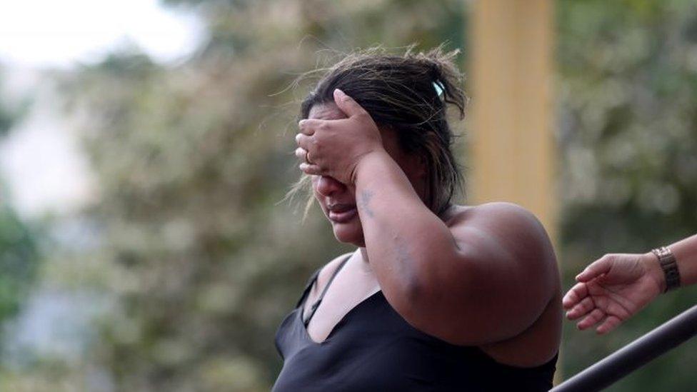 Luciana Nogueira, widow of Evaldo Rosa dos Santos, reacts at the Institute of Forensic Science, after recognizing the body of her husband, who was killed during a military operation in Rio de Janeiro, Brazil April 8, 2019.