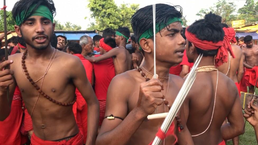 Rahul (centre) chanting