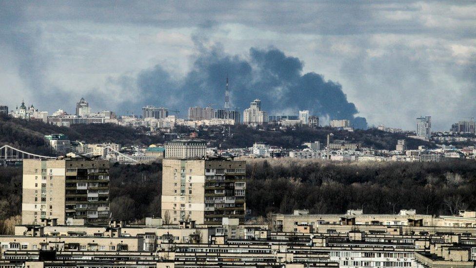 Smoke rises over the part of Ukraine's capital situated on the right bank of the Dnipro River in the morning on Sunday, Kyiv, capital of Ukraine.