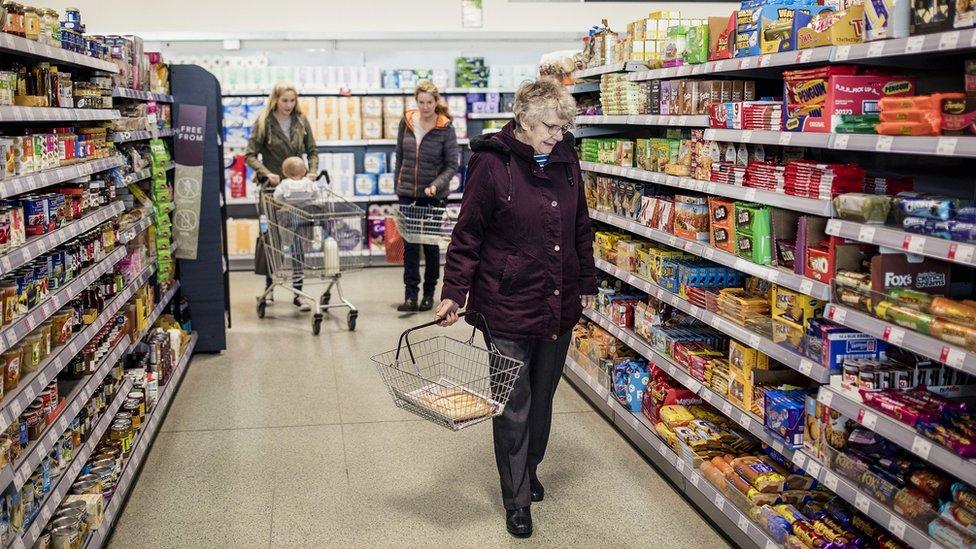 family shopping in supermarket