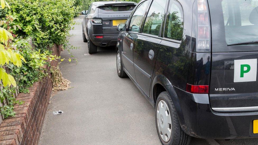 Cars on the pavement