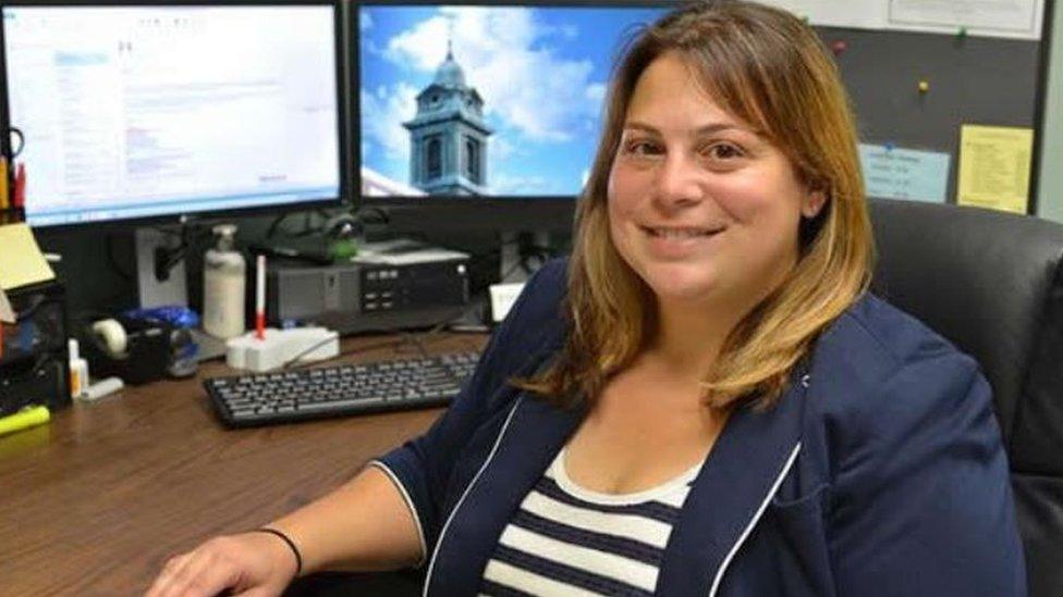 Jacyln Schildkraut posing at a computer