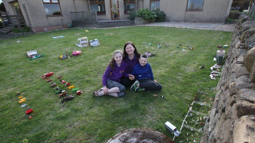 girl-boy-and-woman-with-lego.