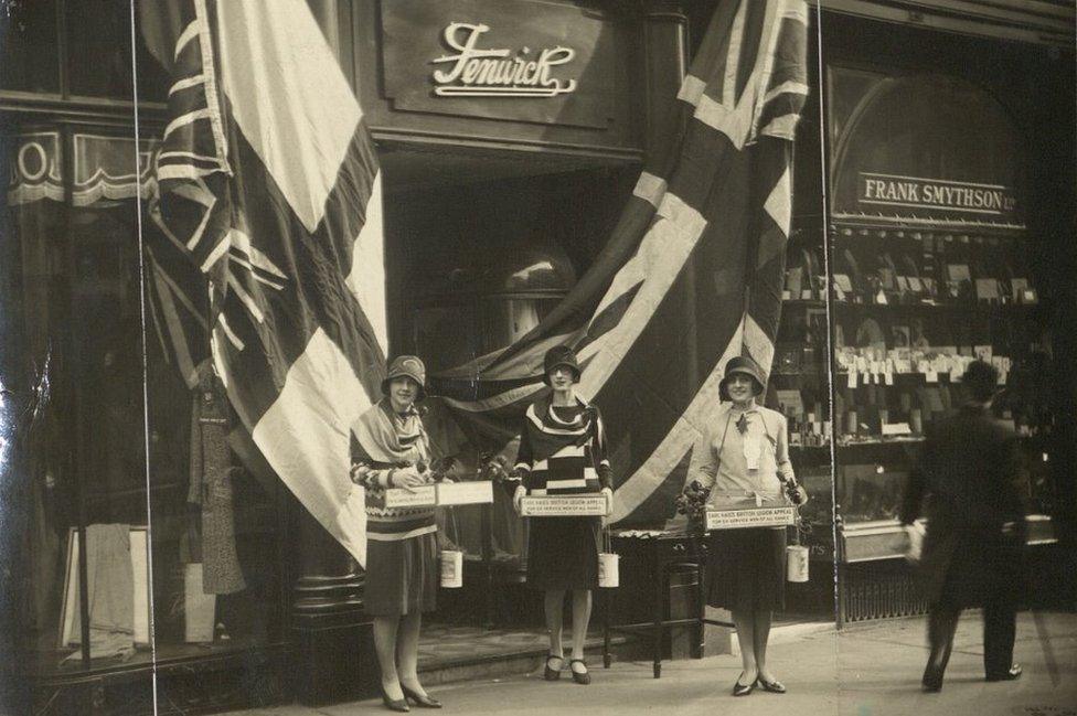 Woman collecting on Flag Day outside the Bond Street store