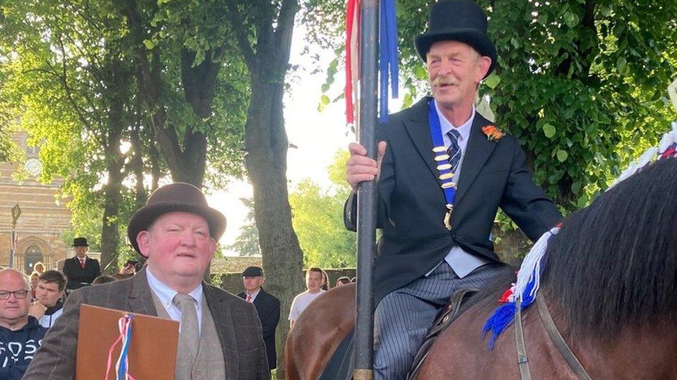 The Bailiff, Frank York, reads the town charter on horseback