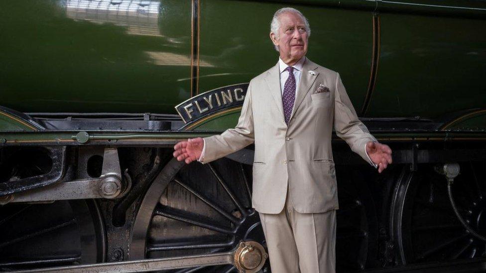 King Charles gestures during his visit to Pickering