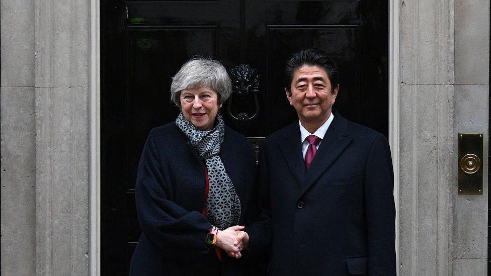 theresa may and shinzo abe