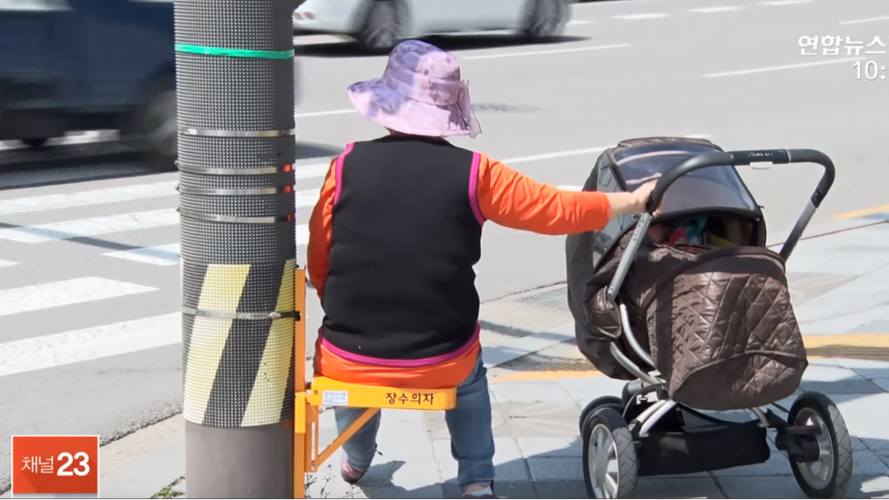 Chair for older pedestrians to rest at road crossings, Namyangju, South Korea