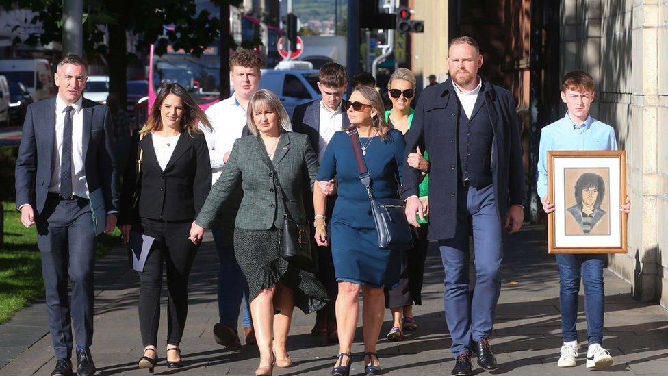 The family of Loughlin Maginn at Belfast High Court on Friday