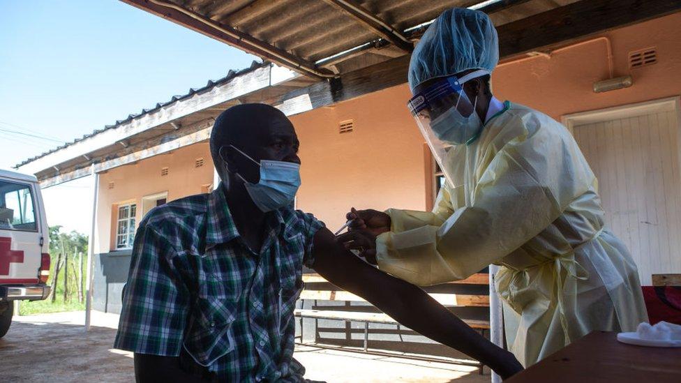 vaccine-being-given-by-a-nurse-in-Zimbabwe.