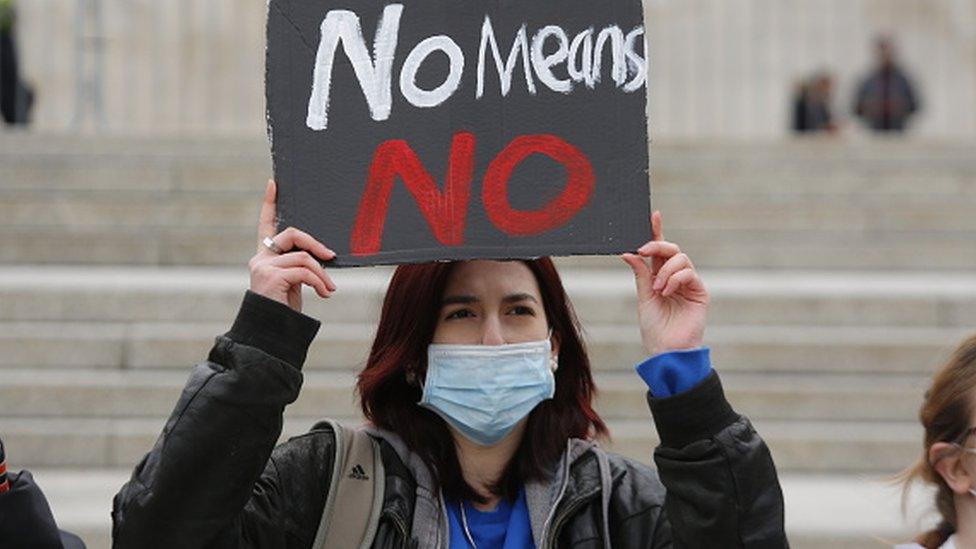 People gather at Trafalgar square to protest the violence against women in London