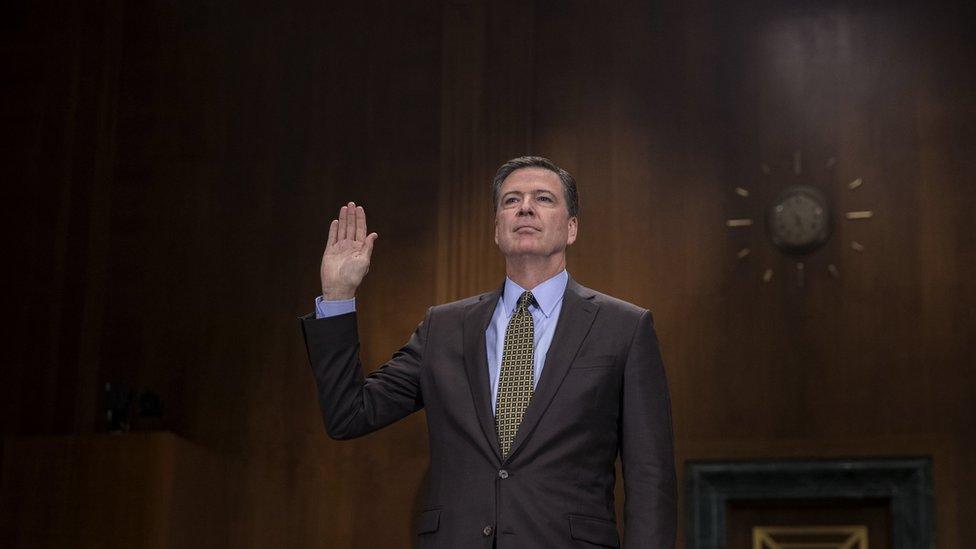 FBI Director James Comey is sworn in prior to testifying before the Senate Judiciary Committee hearing on "Oversight of the Federal Bureau of Investigation." on Capitol Hill in Washington, DC.