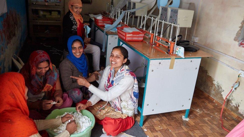 Women making sanitary pads