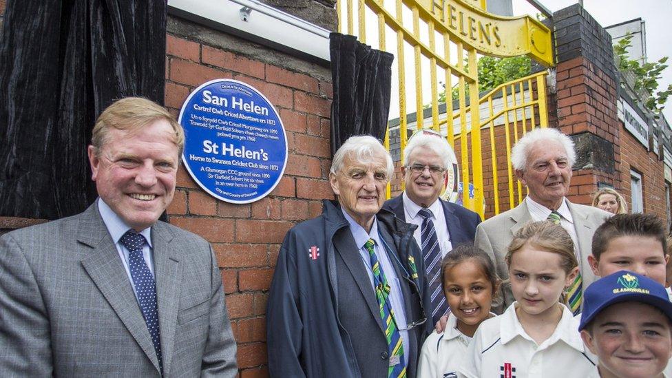 The blue plaque at st helens, installed on the ground.