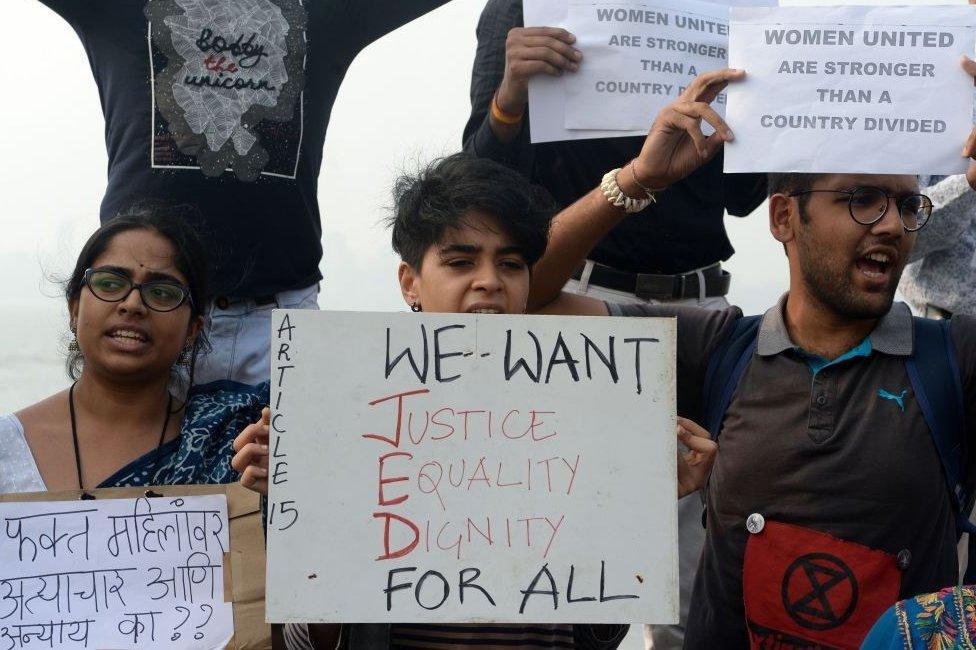 Activists and supporters hold placards and shout slogans to protest against the alleged rape and murder of a 27-year-old veterinary doctor in Hyderabad and other recent sexual assaults, in Mumbai on December 8, 2019.