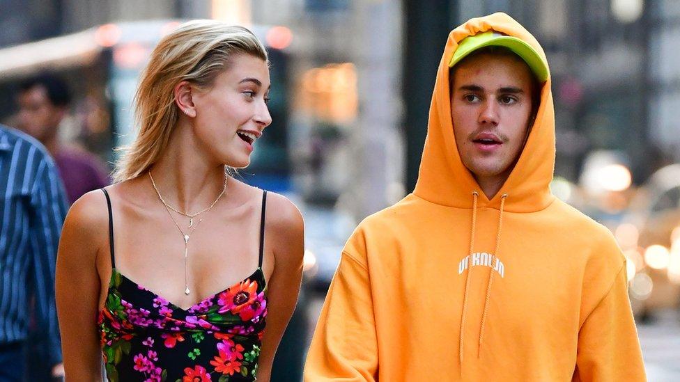 Hailey and Justin walking in New York