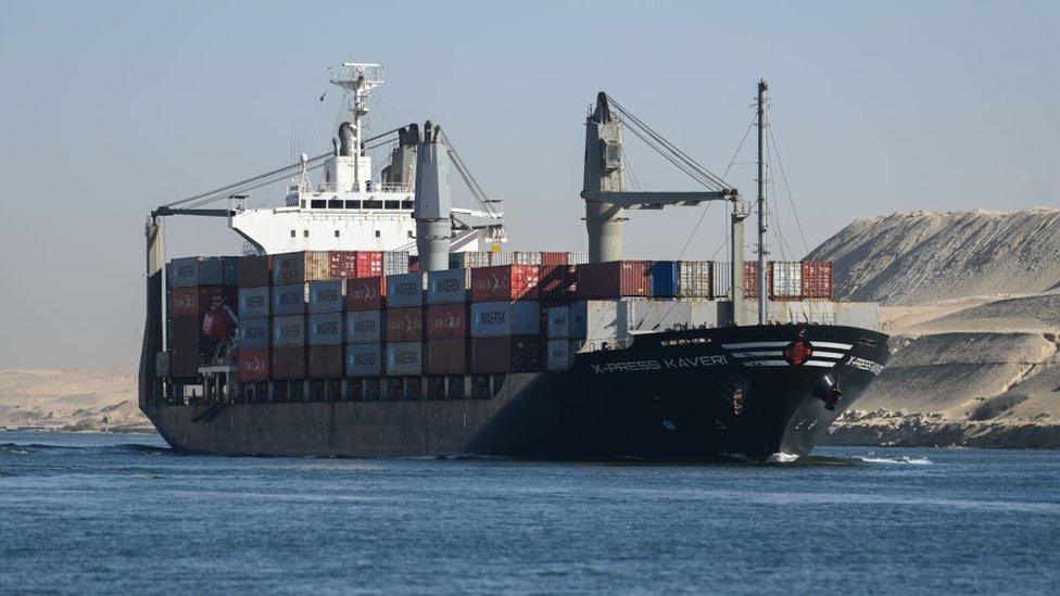 A ship transits the Suez Canal towards the Red Sea