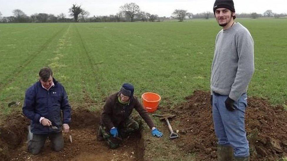 This is a photo of Tom at the site where he found the gold pendant and other jewellery