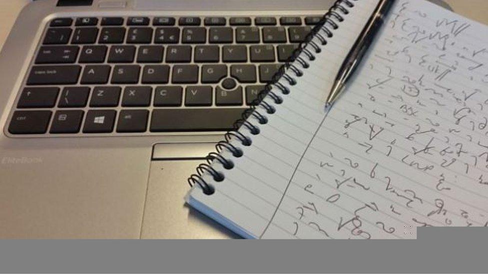 Shorthand notes and a laptop