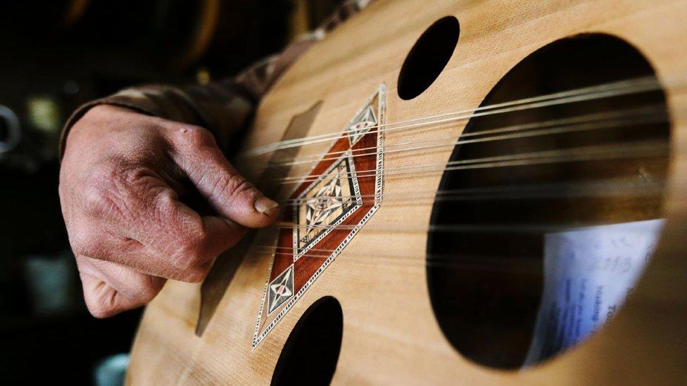 File image showing a man playing an oud (4 January 2017)