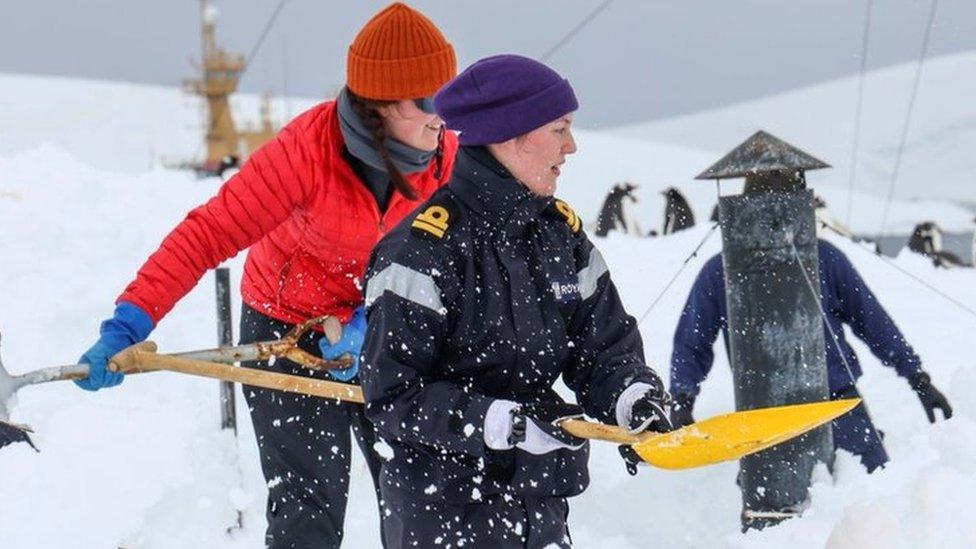 The Royal Navy personnel from HMS Protector digging out the Port Lockroy site