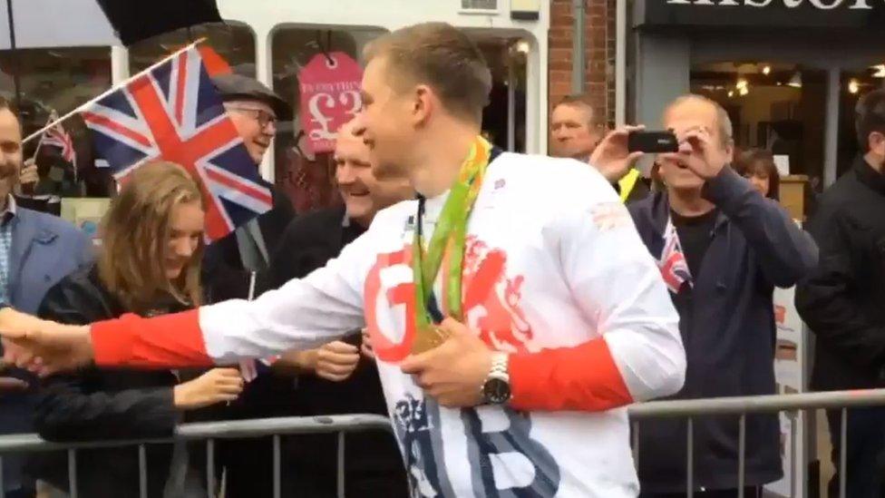 Adam Peaty shook hands with well wishers