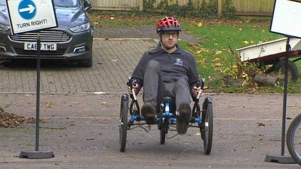 Kevin Rahman-Daultrey on a specially adapted bike