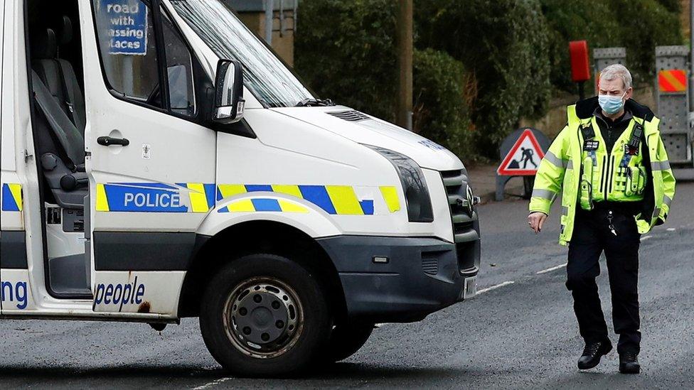 Greater Manchester Police officer and van