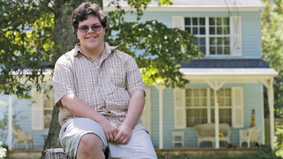 Gavin Grimm poses in front of his home in Gloucester, Virginia