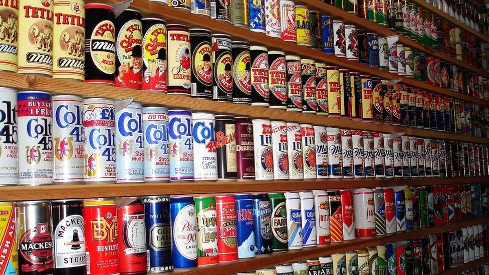 Beer cans on shelves