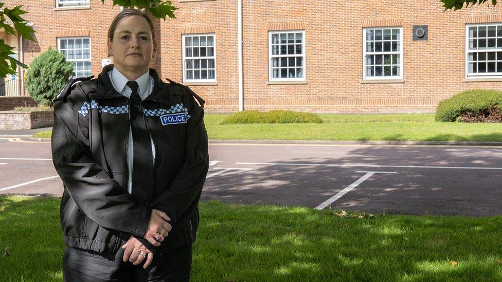 Chief Inspector Gill Hughes outside the red-brick Wiltshire Police HQ in Devizes in her police uniform